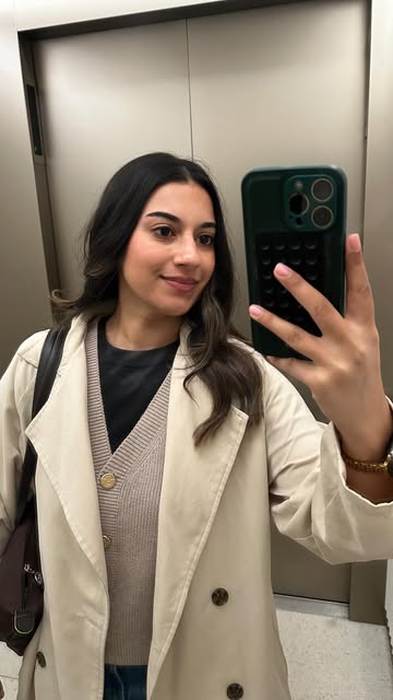 Krupa, the person behind eyedeas, in a cream coat